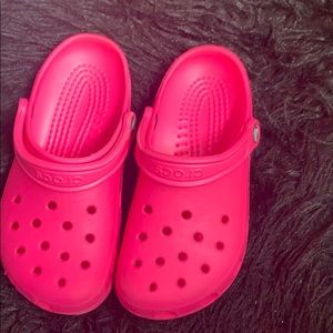 Hot pink crocs.